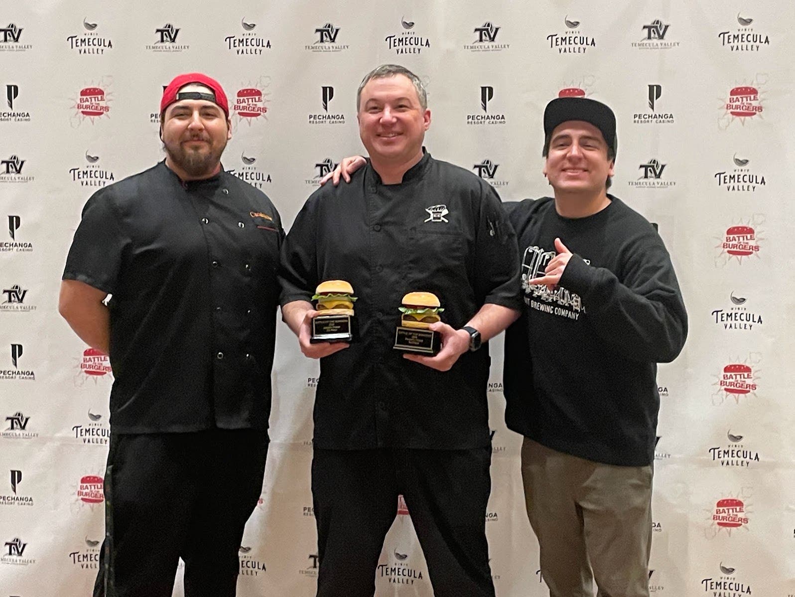 A showcase of previous winners from the Battle of the Burgers, highlighting creative and delicious entries.