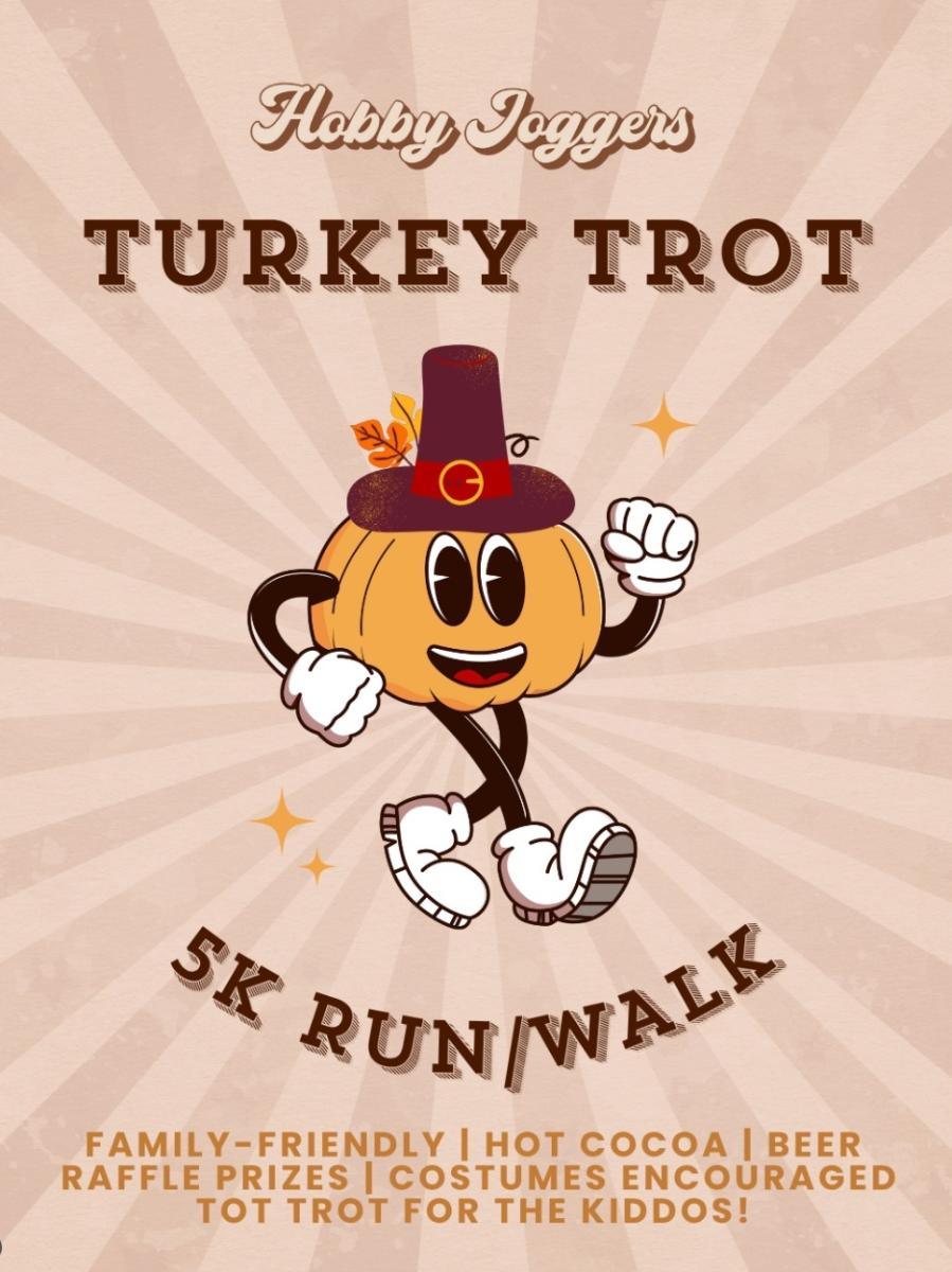 Runners and walkers taking part in a community Turkey Trot 5K, capturing the festive race-day energy.
