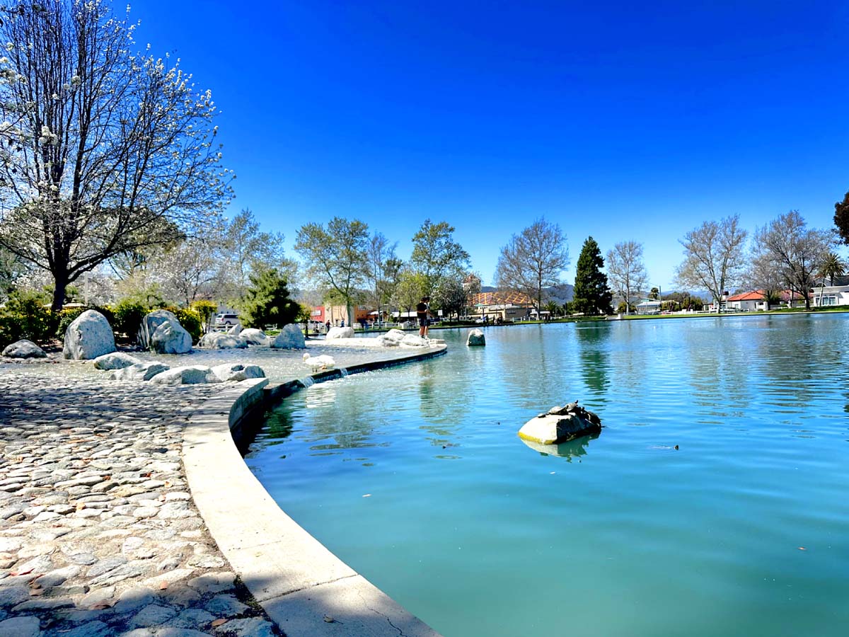 Volunteers and resource information at the Duck Pond area, supporting veterans and their families.